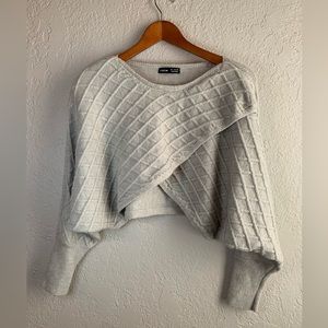Cropped knit long sleeved sweater. Size small